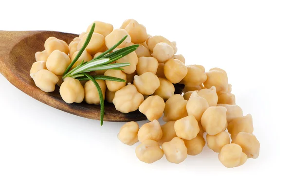 Chickpeas over spoon — Stock Photo, Image