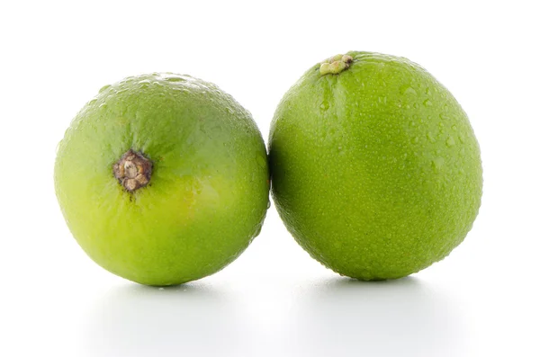 Färska gröna limefrukter — Stockfoto