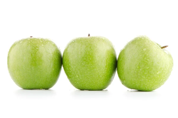 Три зеленых яблока — стоковое фото