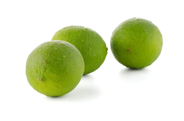 Färska gröna limefrukter — Stockfoto