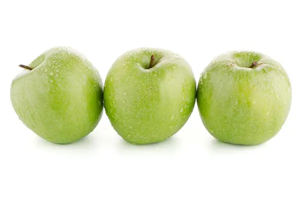 Три свіжих зелених яблука — стокове фото