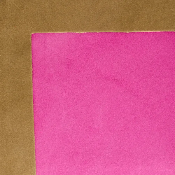 Nahaufnahme aus braunem und rosa Leder — Stockfoto
