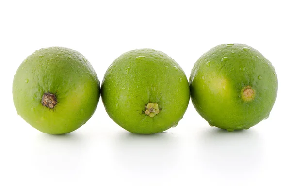 Färska gröna limefrukter — Stockfoto