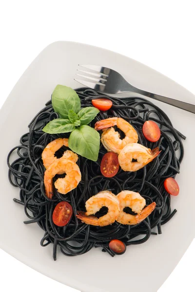 Black spaghetti with shrimps — Stock Photo, Image