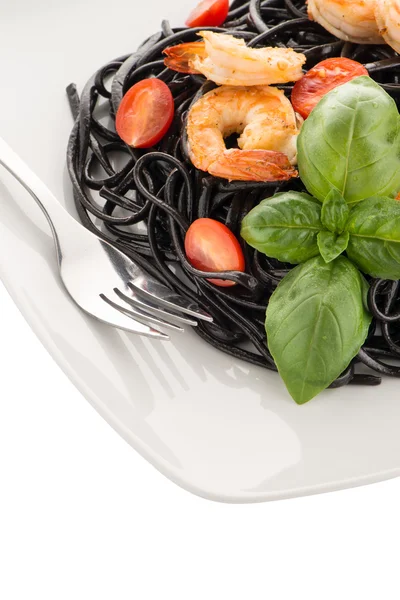 Black spaghetti with shrimps — Stock Photo, Image