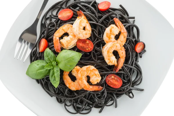 Black spaghetti with shrimps — Stock Photo, Image