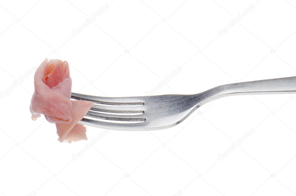 Slice of ham skewered on a fork 