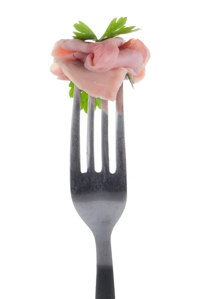 Slice of ham skewered on a fork — Stock Photo, Image