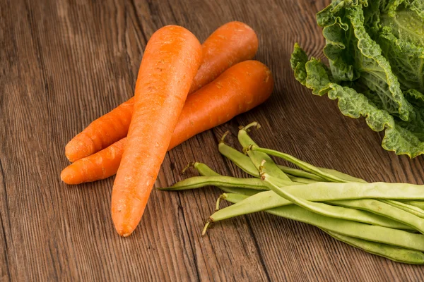 Carrots and green beans — Stock Photo, Image