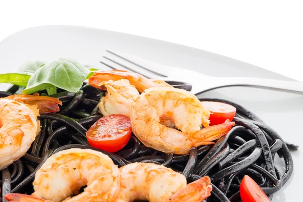 Black spaghetti with shrimps — Stock Photo, Image