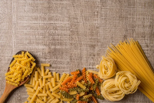 Uncooked italian pasta — Stock Photo, Image