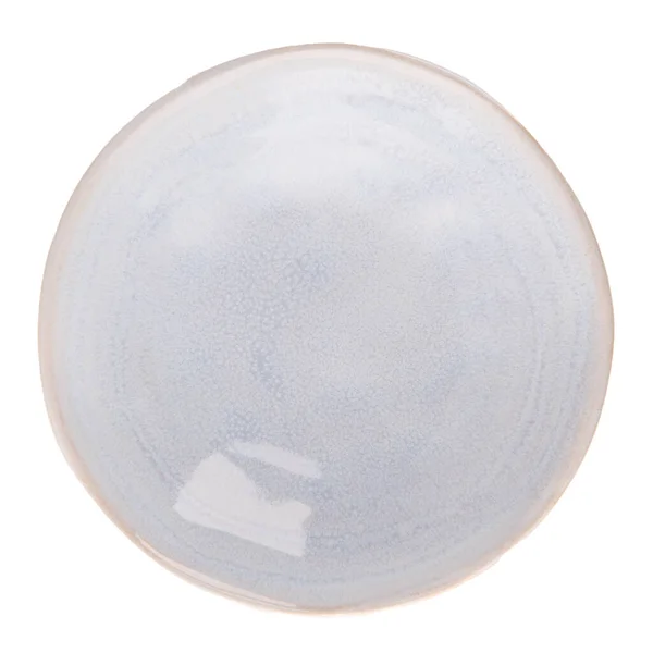 白色反光背景的蓝色陶瓷碗 — 图库照片