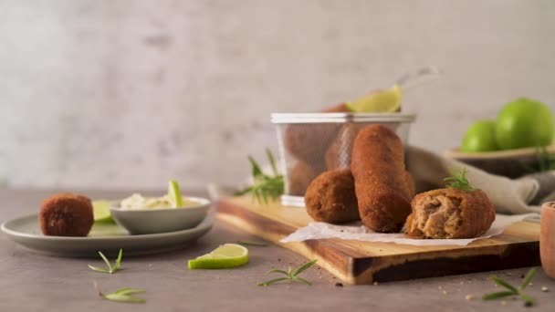 Meat Croquets Rosemary Leaves Lemons Wooden Cutting Board Kitchen Counter — Stok video