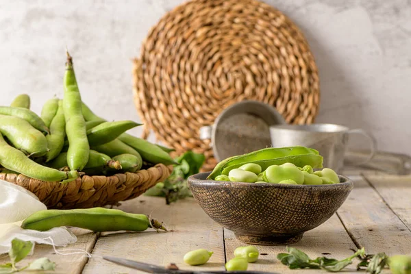 Fresh Raw Green Broad Beans Wooden Table — kuvapankkivalokuva