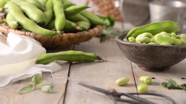 Fresh Raw Green Broad Beans Wooden Table — Stock Video