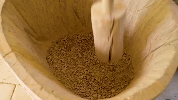 Amarante Portugal April Potter Performs Manual Grinding Clay Using Wooden — Stock video