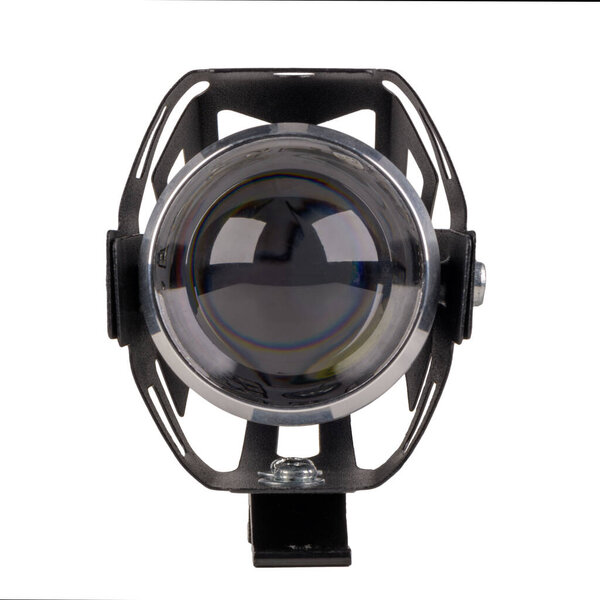 Close-up motorcycle headlight isolated in a white background.