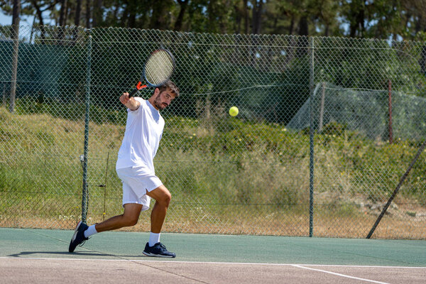 Tennis Player Hitting Backhand Ball Racket Court Stock Photo