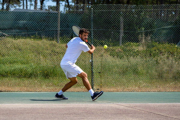 Tennis Player Hitting Backhand Ball Racket Court Stock Image