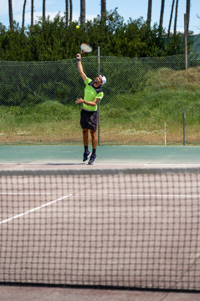 Tennis Player Performing Service Court Stock Image