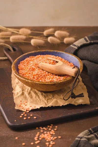 Red Lentils Ceramic Bowl Wooden Scoop Kitchen Countertop — Stockfoto