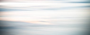 Rippled water surface at the sea during golden hour sunset