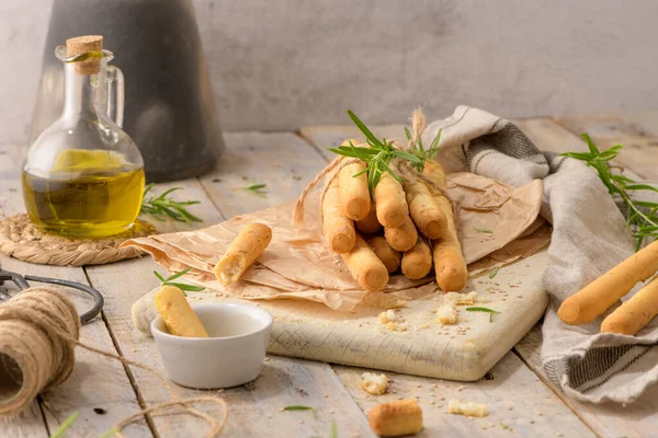Traditional Italian Breadsticks Grissini Rosemary Olive Oil Sesame Seeds Wooden — Stok fotoğraf
