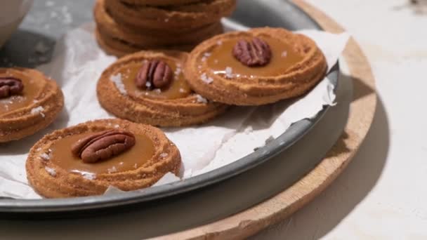 Caramel Cookies Pecan Nuts Served Roud Plates Kitchen Baking — Stock Video