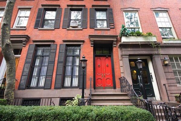 NEW YORK CITY - JULY 31: Residential building in New York City's Chelsea district seen on July 31, 2012. This historic section is now a much sought after neighborhood for New Yorkers and tourists.