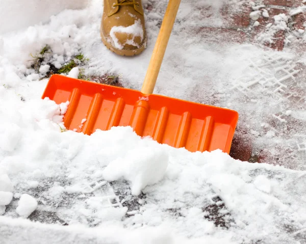 Skotta snö — Stockfoto