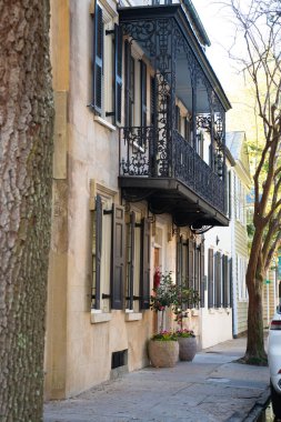 Charleston, South Carolina, USA - March 18, 2022:  Street scene in the historic southern city of Charleston South Carolina with typical homes in view