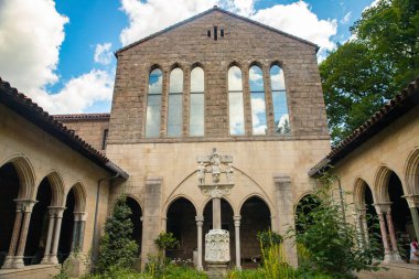 Exterior View of the Met Cloisters in Washington Height Manhattan with architectural details and garden