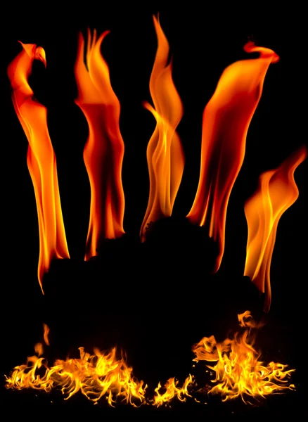 Φωτοβολίδα φωτιά πάνω σε μαύρο φόντο — Φωτογραφία Αρχείου