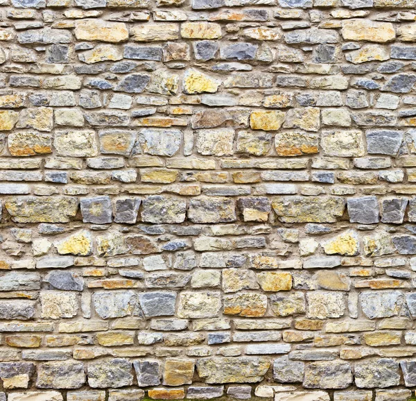 Antika stenmuren i bakgrunden — Stockfoto