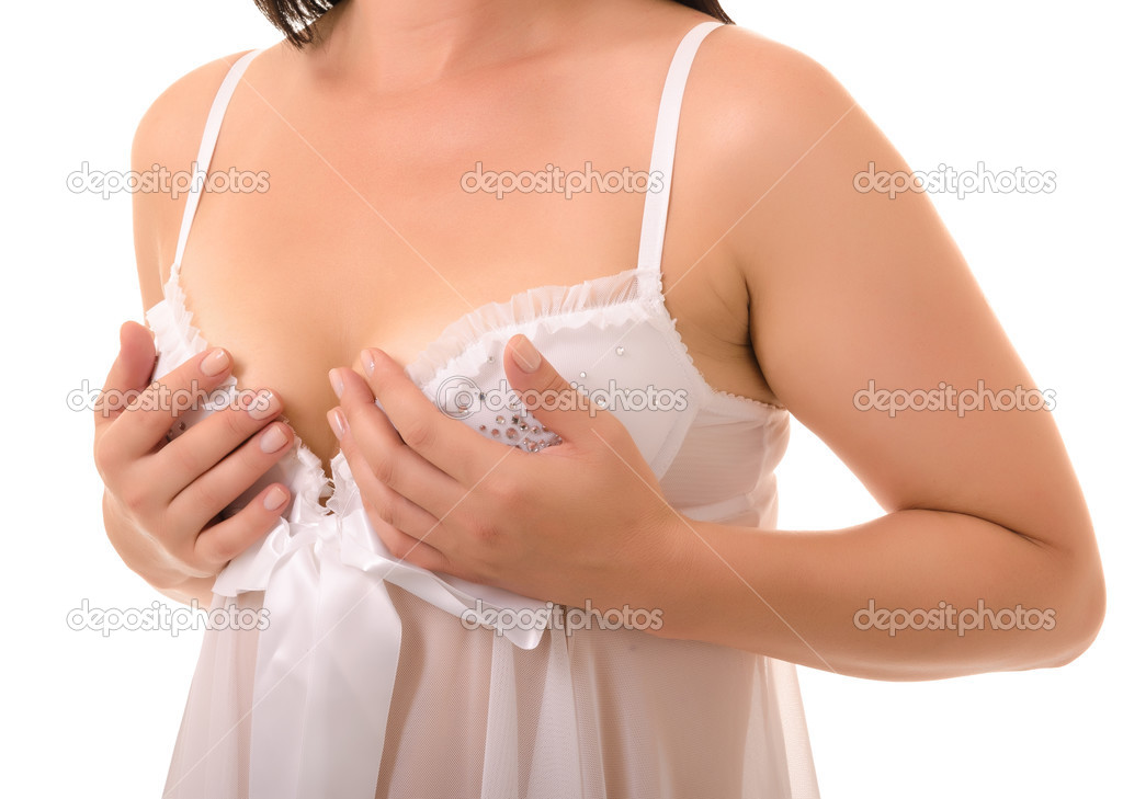woman examining breast mastopathy or cancer