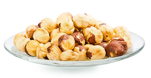 A pile of shell-less hazelnuts, isolated on white background — Stock Photo, Image