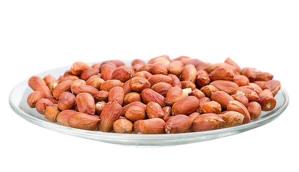 Heap of roasted peanuts in a saucer — Stock Photo, Image