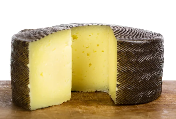 Smoked cheese on cutting board — Stock Photo, Image
