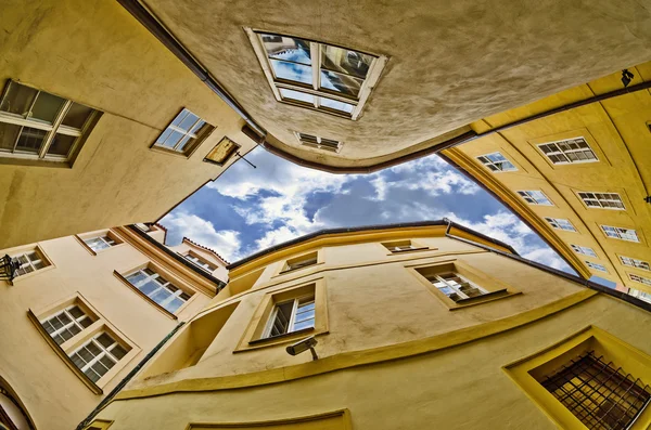 Fisheye lens look of the Old Town on sky background . Prague — Stock Photo, Image