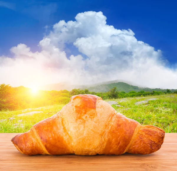 Gold-brown baked croissant — Stock Photo, Image