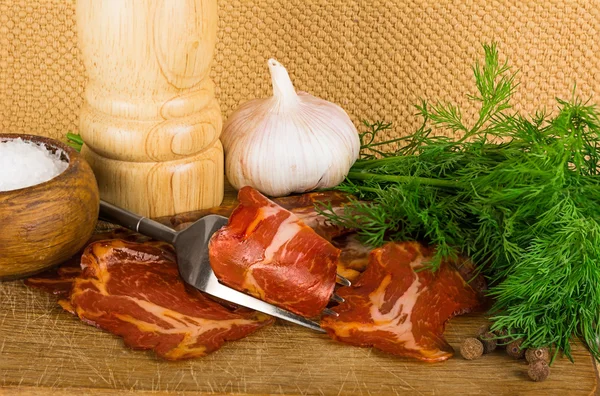 Simple farm bacon, stranded on a fork — Stock Image Simple farm bacon, stranded on a fork Stock Photo