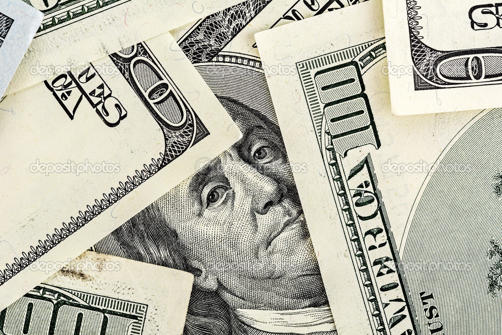 Close-up of Benjamin Franklin Portrait on One Hundred Dollar Bil
