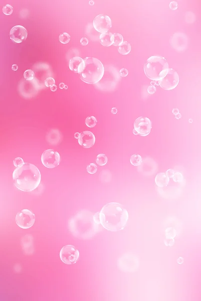 Abstraktní rozmazané krásné růžové pozadí s mýdlové bubliny — Stock fotografie