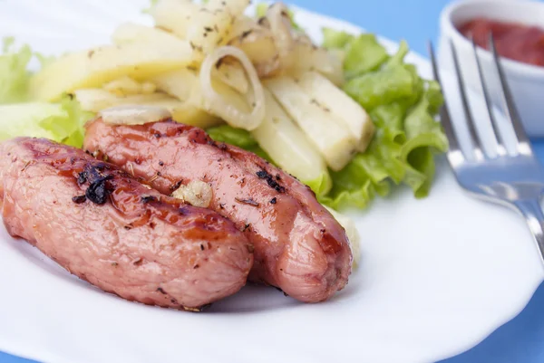 Appetizing fried sausages — Stock Photo, Image