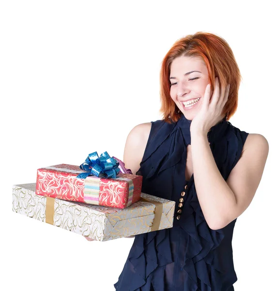 Mujer alegre con cajas regalos sobre un fondo blanco —  Fotos de Stock