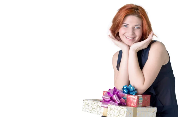Mujeres alegres con cajas regalos sobre un fondo blanco —  Fotos de Stock