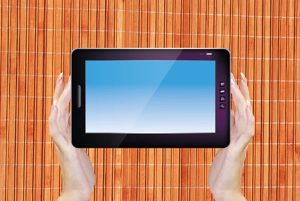 Digitale tablet op houten textuur — Stockfoto