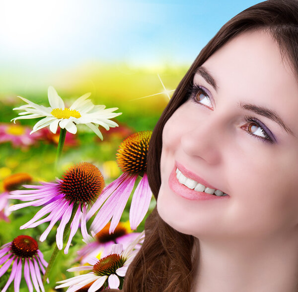 Beauty Young Girl over nature green background. Spring.