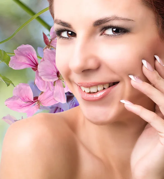 Beautiful girl with flowers.Spa — Stock Photo, Image