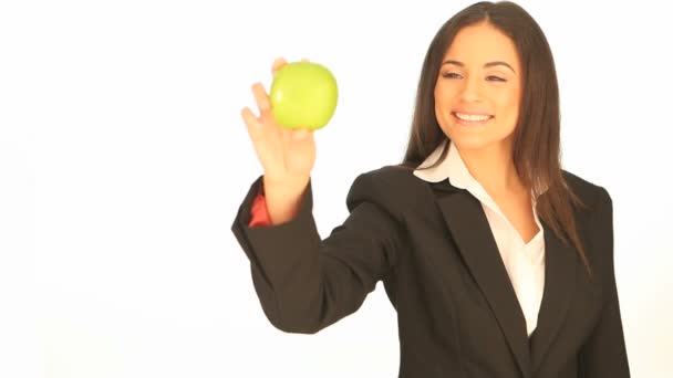 Attractive businesswoman with an apple — Stock Video